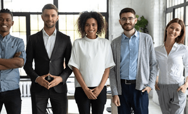 Group of young professionals standing in a row, representing effective debt management for better home security financing