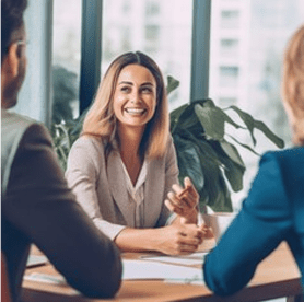 Financial planner advising a couple on how to become debt-free